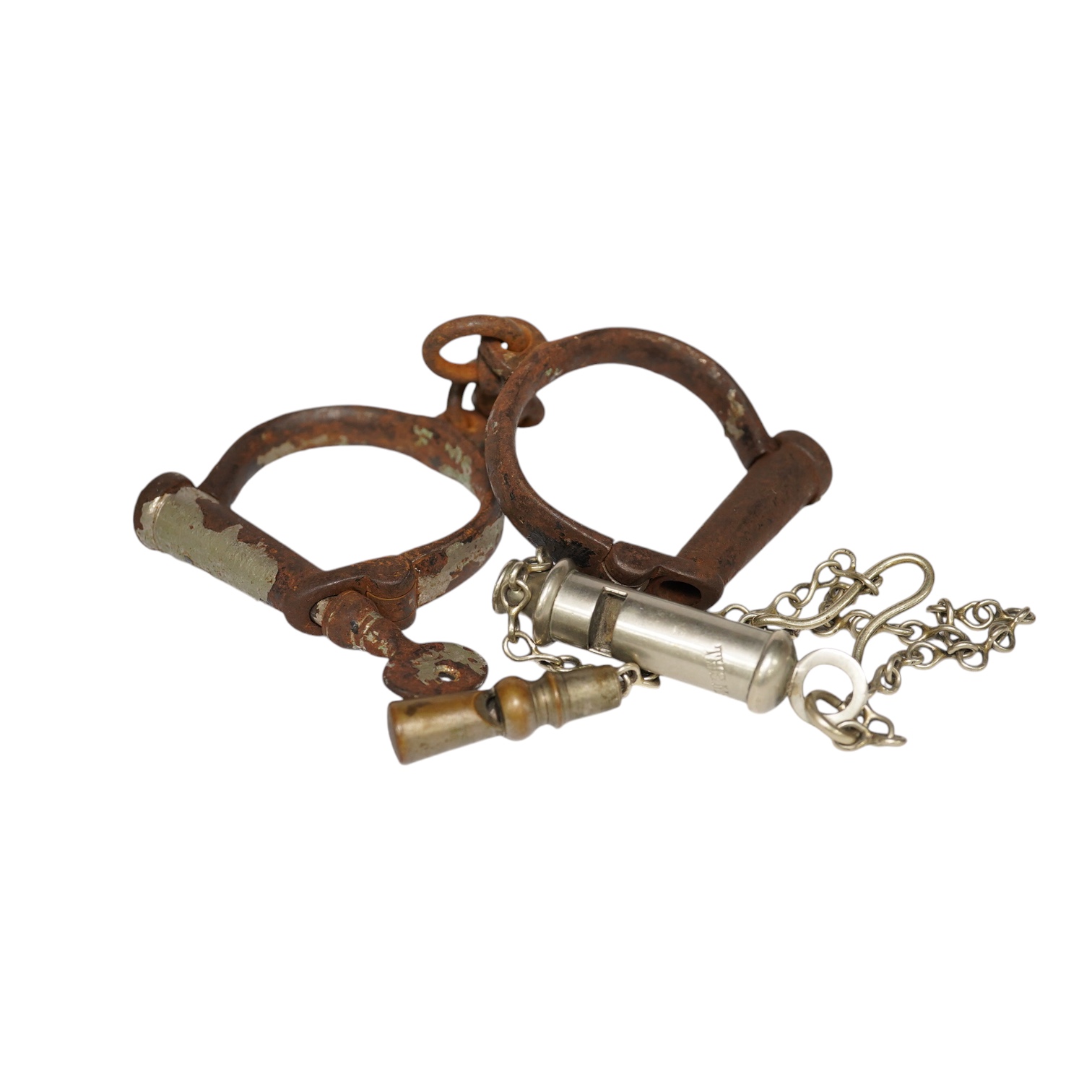 19th/20th century police hand cuffs and two whistles. Condition - poor